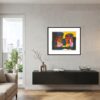 Interieurvoorbeeld van de grote ingelijste litho 'Deux Personnages' van Karel Appel boven een bank. Modern interieur met een kleurrijk kunstwerk van Karel Appel te koop bij Art 4 Living -Gavekunst Rotterdam Hillegersberg