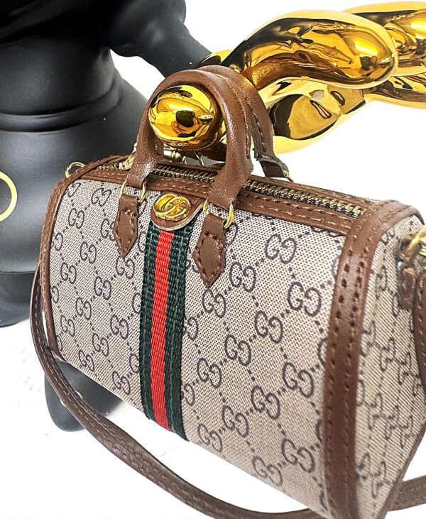 mini tasje Gucci behorend bij beeld Minnie Gucci noir 30 cm