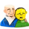 Kleurrijk kunsthars beeldje Forever van Herman Brood met twee omarmende figuren in blauw en groen met de handtekening brood op de voorzijde.