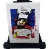 Mini Schilderijtje Herman Brood - De Librije Dit miniatuur-schilderij met ezel toont een afbeelding van chef-kok Jonnie Boer in de kenmerkende, kleurrijke stijl van kunstenaar Herman Brood, gemaakt voor Restaurant De Librije.