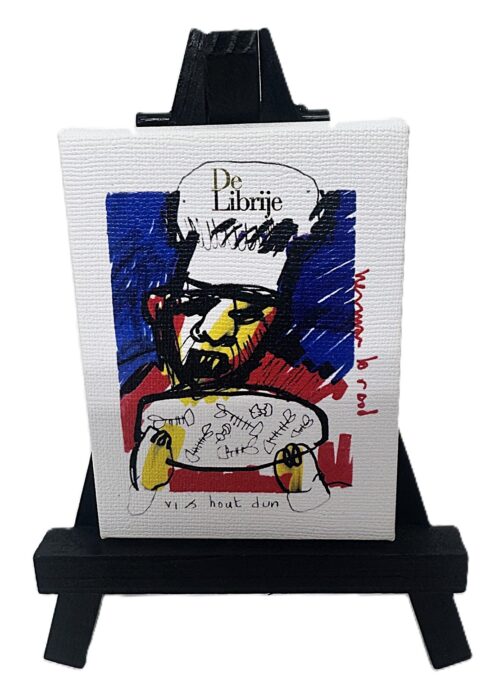 Mini Schilderijtje Herman Brood - De Librije Dit miniatuur-schilderij met ezel toont een afbeelding van chef-kok Jonnie Boer in de kenmerkende, kleurrijke stijl van kunstenaar Herman Brood, gemaakt voor Restaurant De Librije.