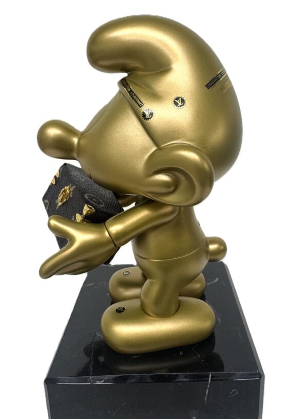smurf petite valise gold zijkant Smurf Petite Valise Gold Edition