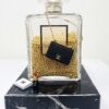 Originele chanel coco mademoiselle fles op marmeren sokkel Originele Coco Mademoiselle Chanelfles